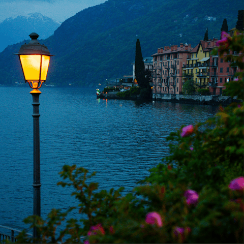 Watch dusk settle over Bellano from the nearby lakeside cafes