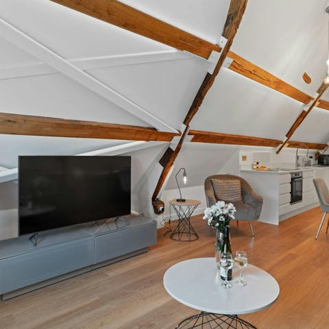 Kick back and relax with a movie under the beautiful old beams