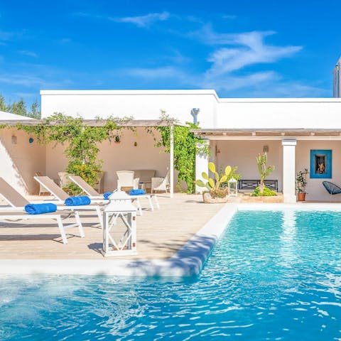 Lounge by the pool, indulging in your summer read