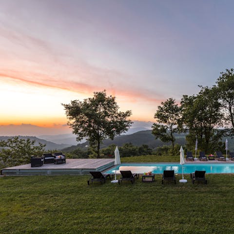 Admire the stunning Italian sunsets from the pool