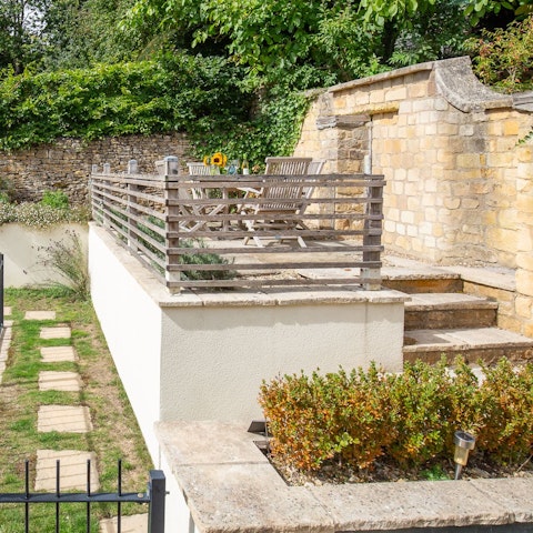 Enjoy a glass of wine outdoors in the summer sunshine