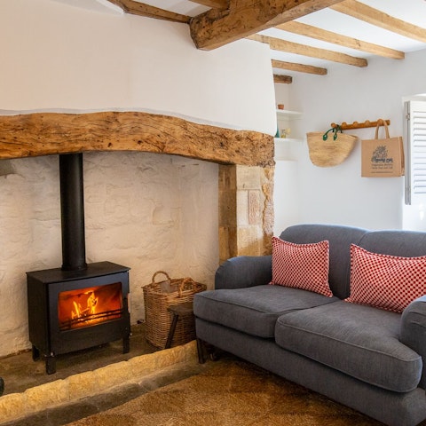 Settle down in the snug to enjoy the warmth of the wood burner