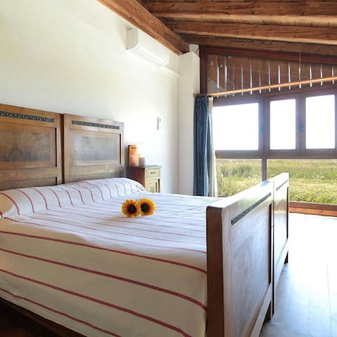 Wake up to lush countryside views