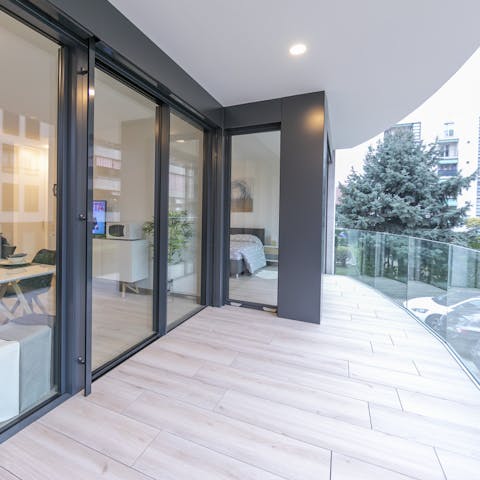 Breathe in the fresh air on the balcony as you sip your morning coffee