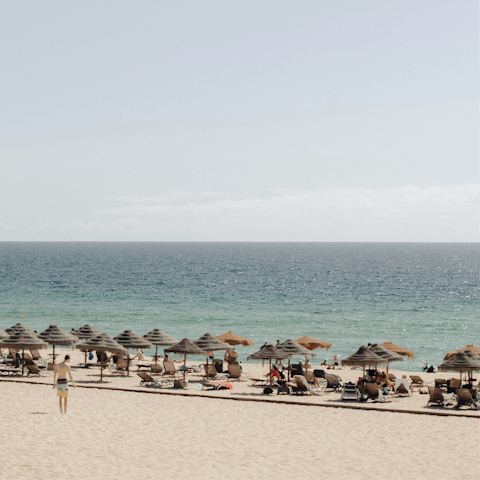 Take a fifteen minute drive down to the stunning sandy beach