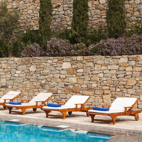 Soak up those balmy rays from plush sun loungers