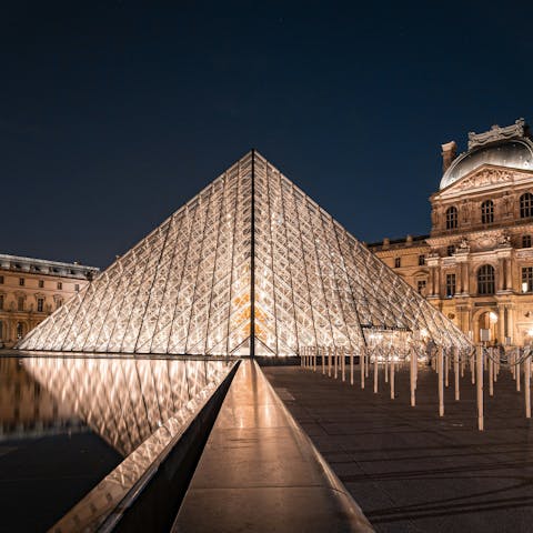 Visit the iconic Louvre, twenty-minutes away on the metro