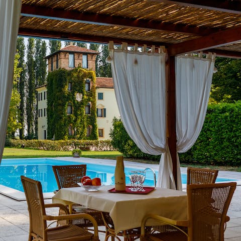 Sit out on the covered terrace at sunset and watch the sky turn pink with your favourite people