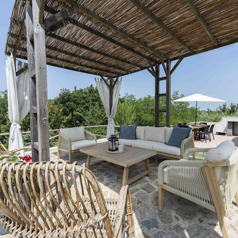 Gather on the terrace for drinks in the fresh air