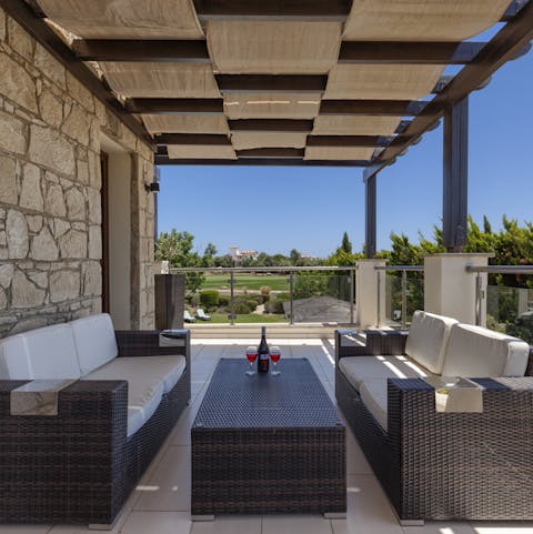 Have sundowner cocktails on the terrace
