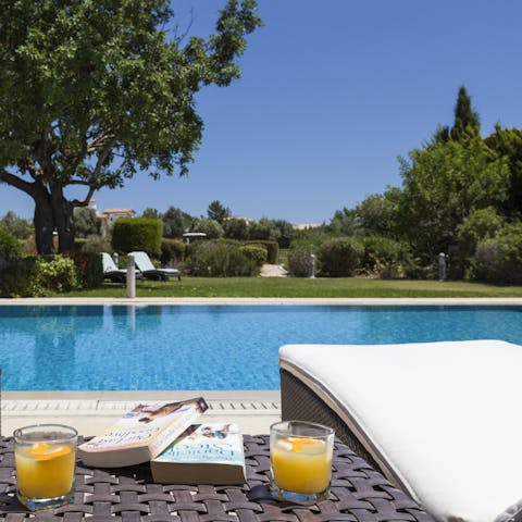 Sunbathe by the pool