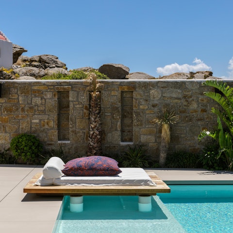 Spend blissful days stretched out by the pool