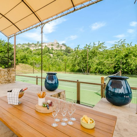 Play tennis on the private court, before drinks on the terrace