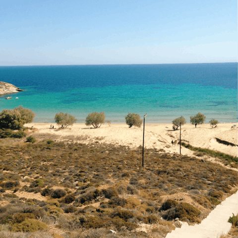 Soak up the Greek sunshine on Agios Prokopios Beach, a twenty-minute walk away