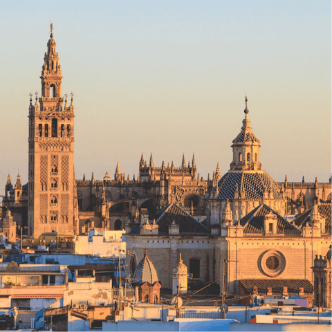 Visit Seville Cathedral, a short walk away