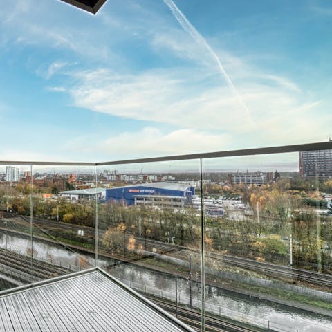 Admire city and canal views from the private balcony