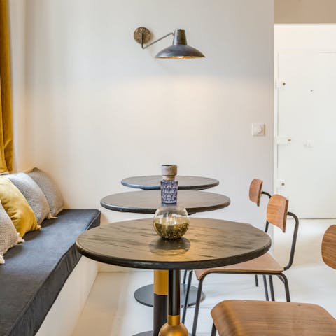 Enjoy a coq au vin at the bistro-style dining table