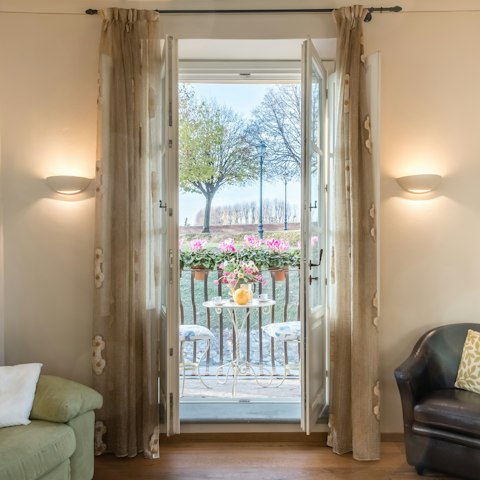 Savour views of the town's historic walls from the patio