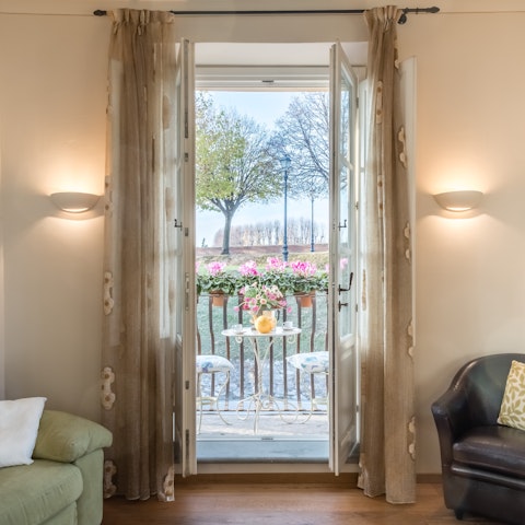 Savour views of the town's historic walls from the patio