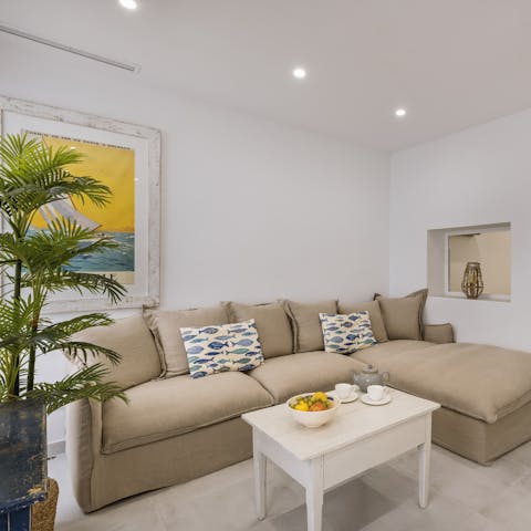 Kick back and relax on the lounge worth L-shaped sofa in the living room