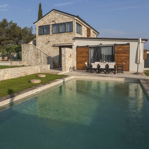 Swim gentle laps in the private swimming pool