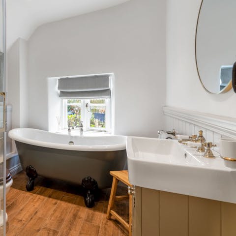 Soak in the clawfoot tub for the ultimate in relaxation