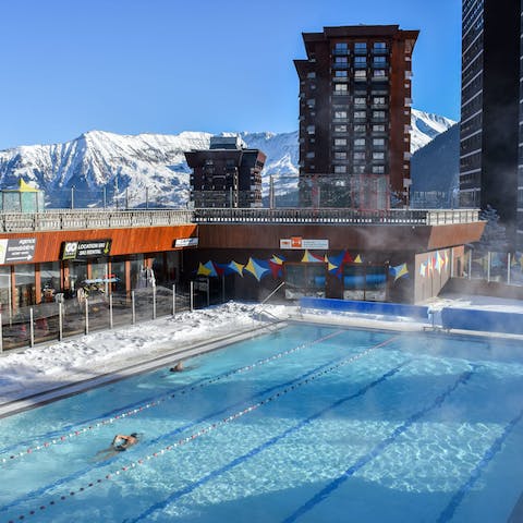 Go for a swim in the steaming heated pool