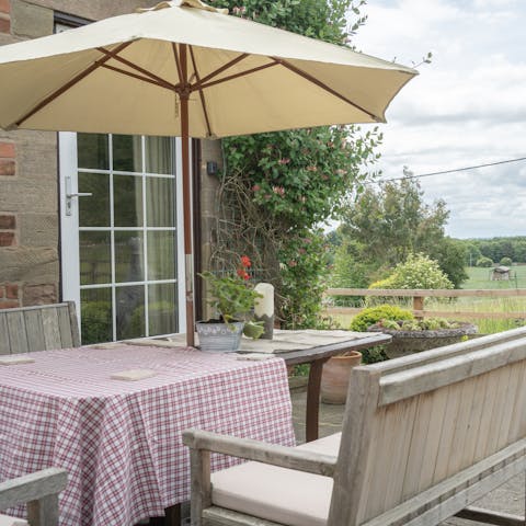 Share coffee and toast on the outdoor table