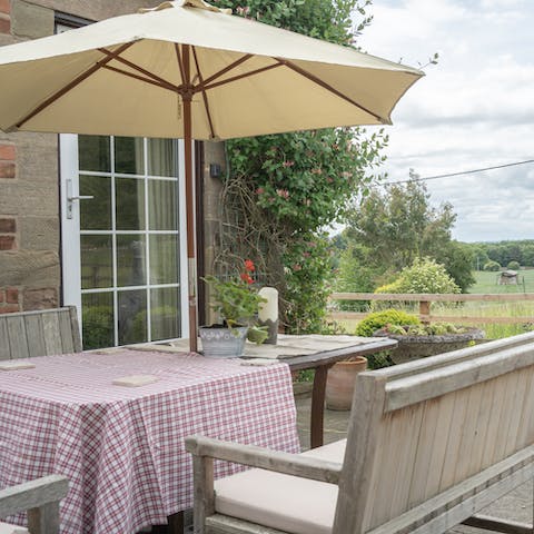 Share coffee and toast on the outdoor table