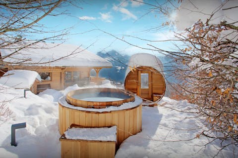 Soothe your muscles in the hot tub and sauna