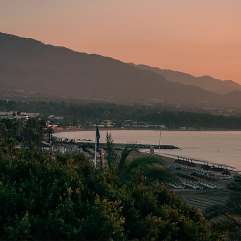 Enjoy magical sunset strolls along the promenade in Marbella