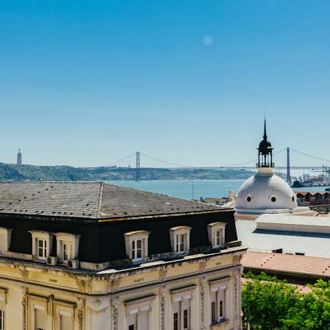 Look out to spectacular views of the 25 de Abril Bridge