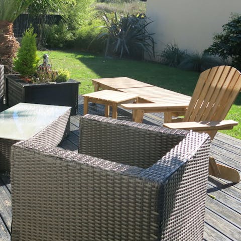 Relax in the sunshine before taking a dip in the pool