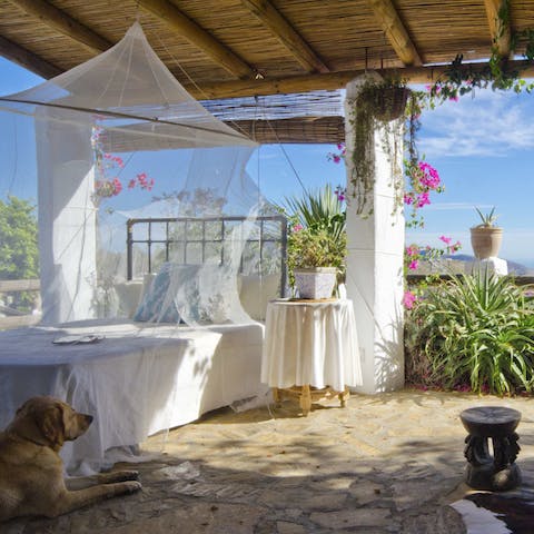 Relax on the covered day bed