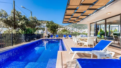 Swim about in the private pool on a balmy afternoon