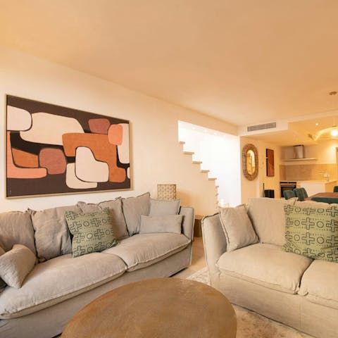 Relax in one of two cosy living rooms