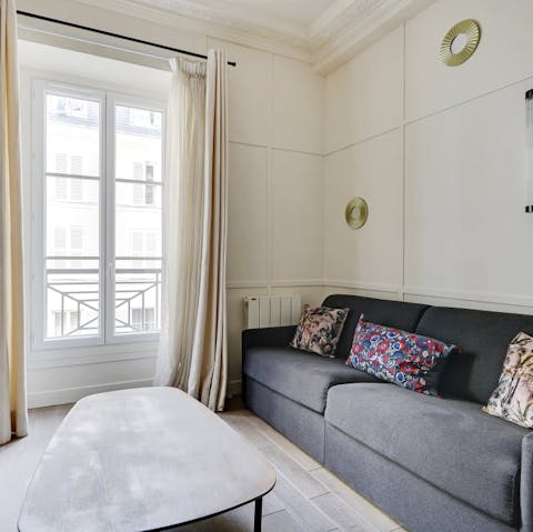 Kick back with a good book in the light-filled living room