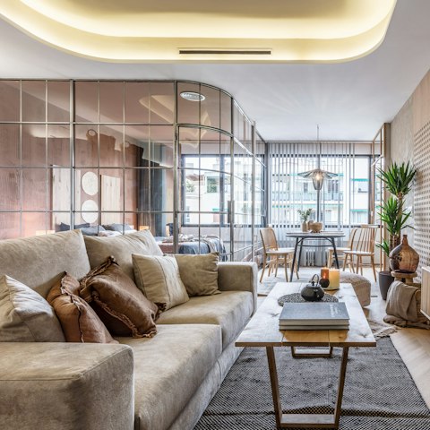 Relax in the beautiful living room with a glass of Spanish wine after a day of Madrid sightseeing