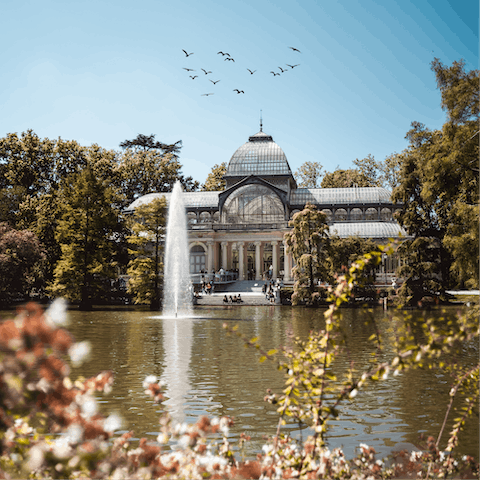 Take a stroll through El Retiro Park, twenty minutes away on foot