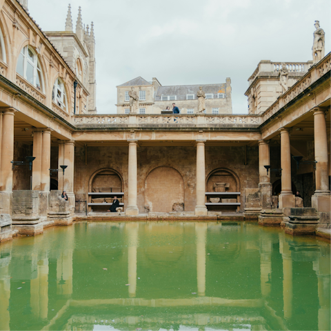 Stay a ten-minute walk from the Roman Baths that gave the city its name