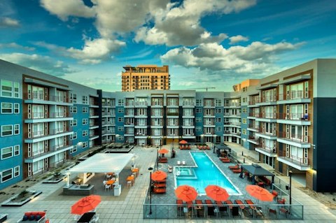 Lounge poolside in the sun-soaked central courtyard
