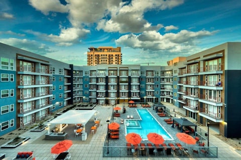 Lounge poolside in the sun-soaked central courtyard