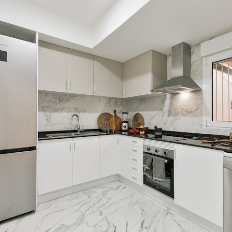Fire up the coffee machine in the well-equipped kitchen