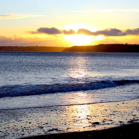 Have a paddle at Paignton Beach – it's twelve minutes away by car