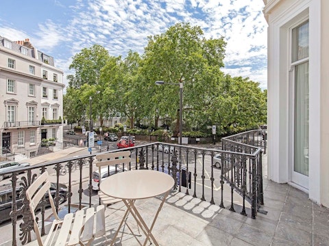 Step out and enjoy drinks on the private balcony