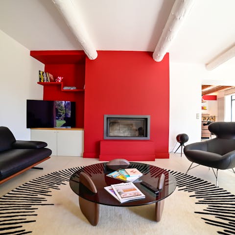 Spend chillier evenings enjoying the living room's fireplace