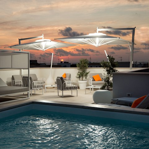 Enjoy a twilight dip in the shared roof terrace's plunge pool