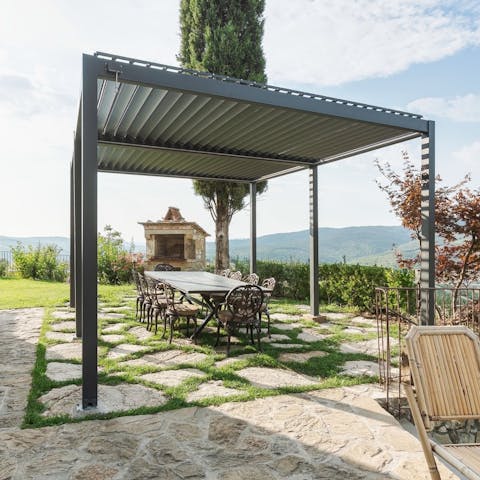 Gather for a barbecue on the picturesque terrace