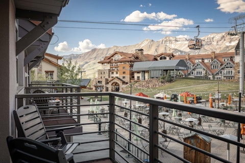 Gaze out at gondola views and snow-capped peaks rising above the village