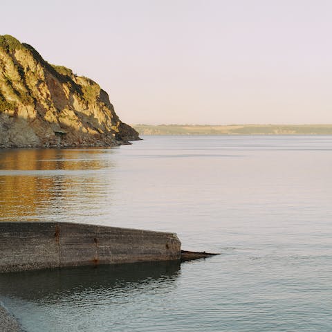 Open the door and stroll down to the edge of the sea